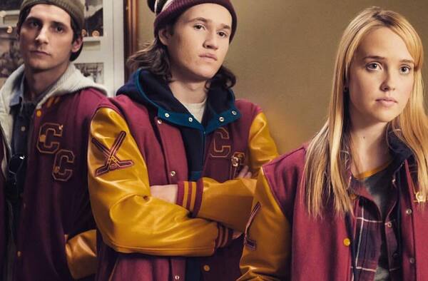 Maroon and gold custom varsity jackets for a student group